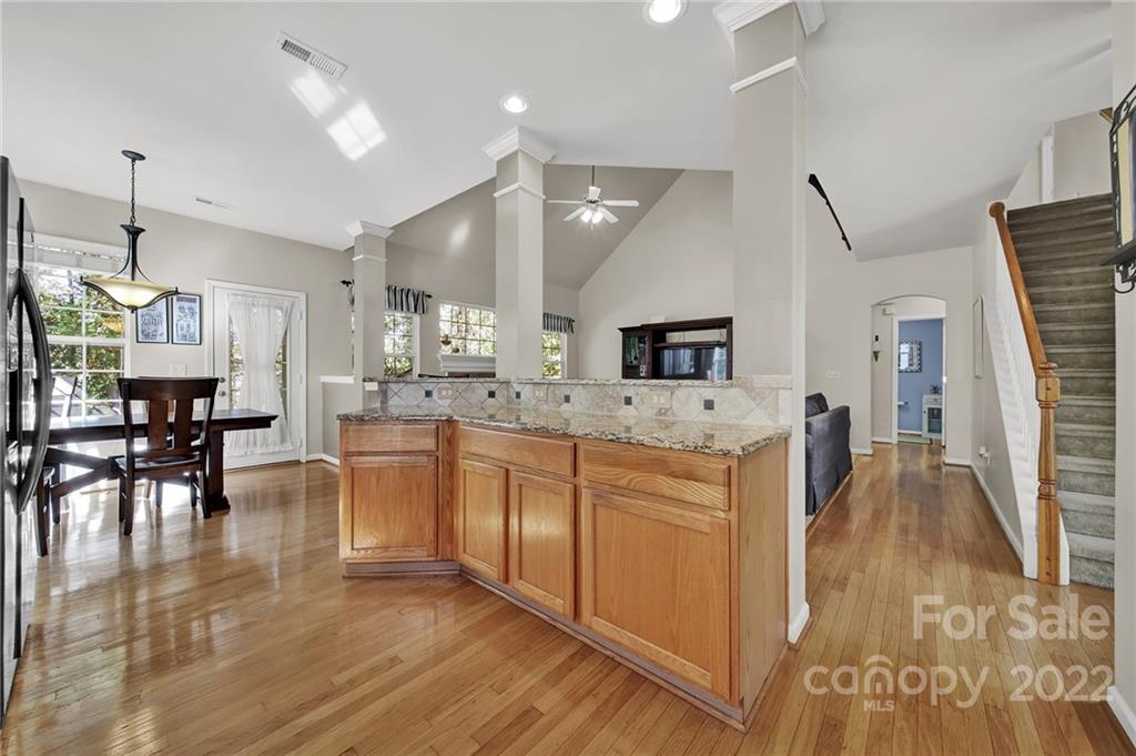 1640 Spandril Lane Fort Mill, SC 29708 - Photo 15 of 48 a large white kitchen with lots of counter space and chandelier