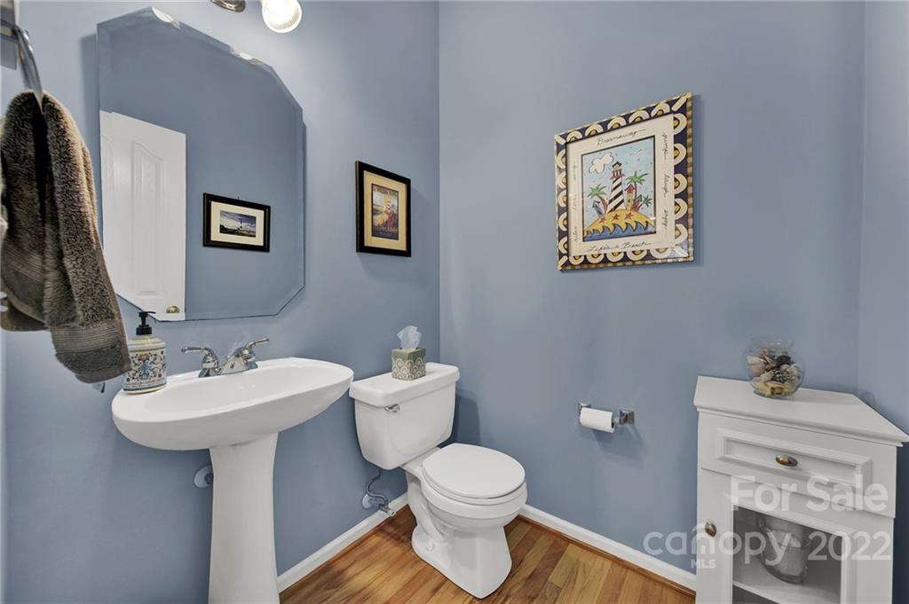 1640 Spandril Lane Fort Mill, SC 29708 - Photo 17 of 48 a bathroom with a sink mirror and toilet