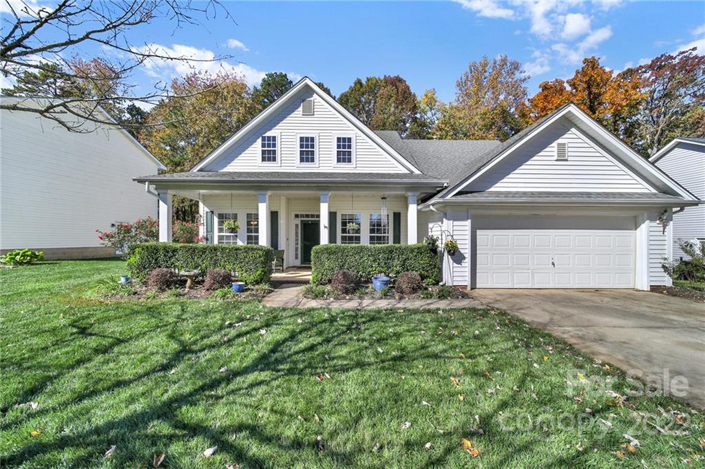 1640 Spandril Lane Fort Mill, SC 29708 - Photo 2 of 48 a front view of a house with sitting area and garden