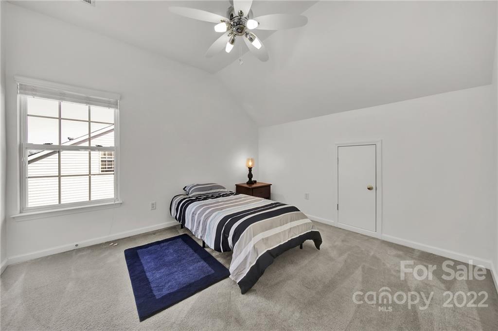 1640 Spandril Lane Fort Mill, SC 29708 - Photo 27 of 48 a bedroom with a bed and a window