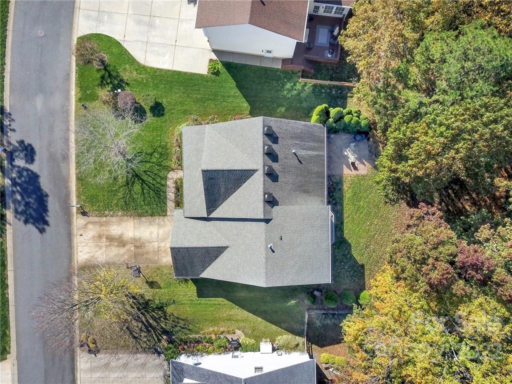 1640 Spandril Lane Fort Mill, SC 29708 - Photo 44 of 48 an aerial view of a house with a yard basket ball court and outdoor seating