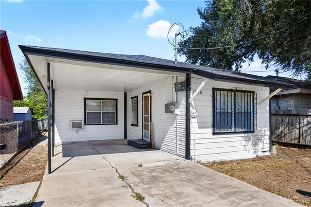 a front view of a house with a porch