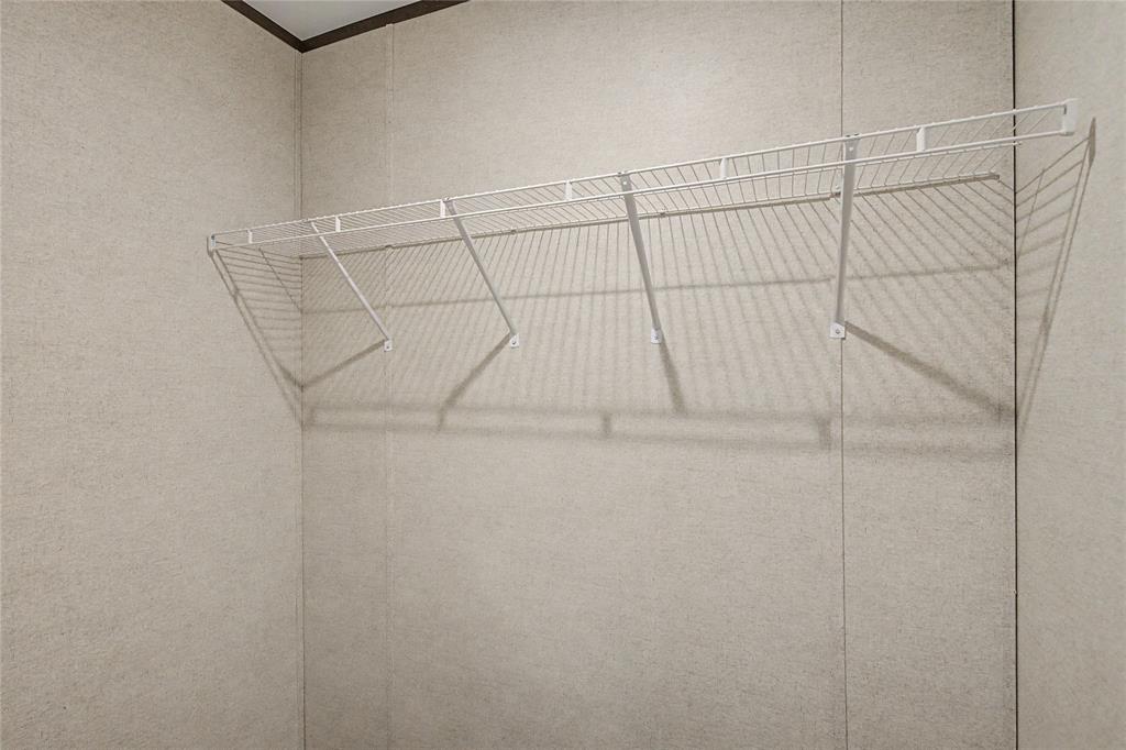 177 New Highland Road Springtown, TX 76082 - Photo 26 of 40 Closet with white wire shelving system