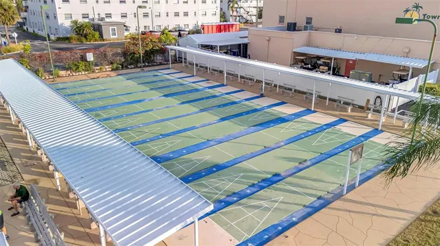 a view of swimming pool with a patio
