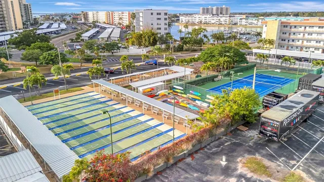 a view of a lake with tall buildings