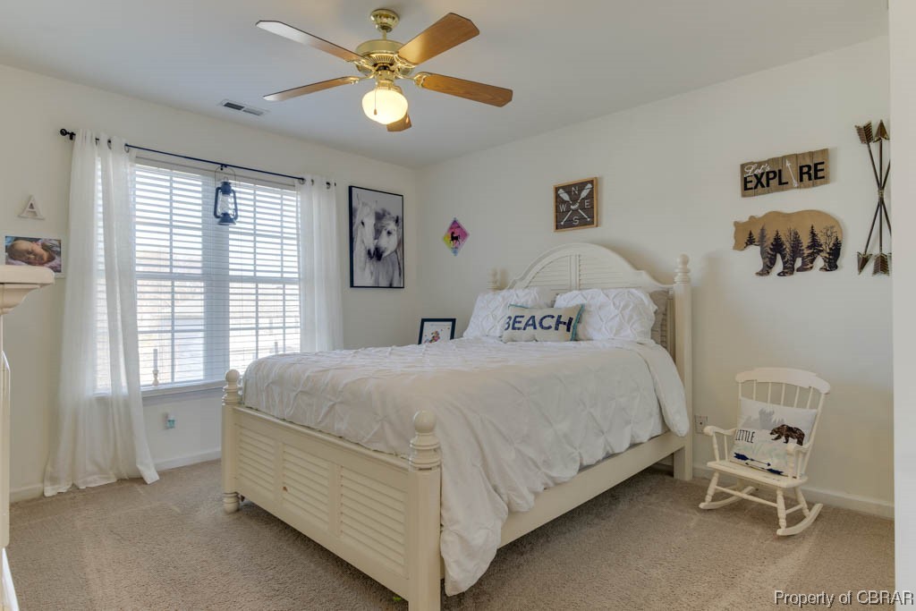 4 Willow Road Hampton, VA 23664 - Photo 35 of 48 Bedroom featuring light colored carpet and ceiling fan