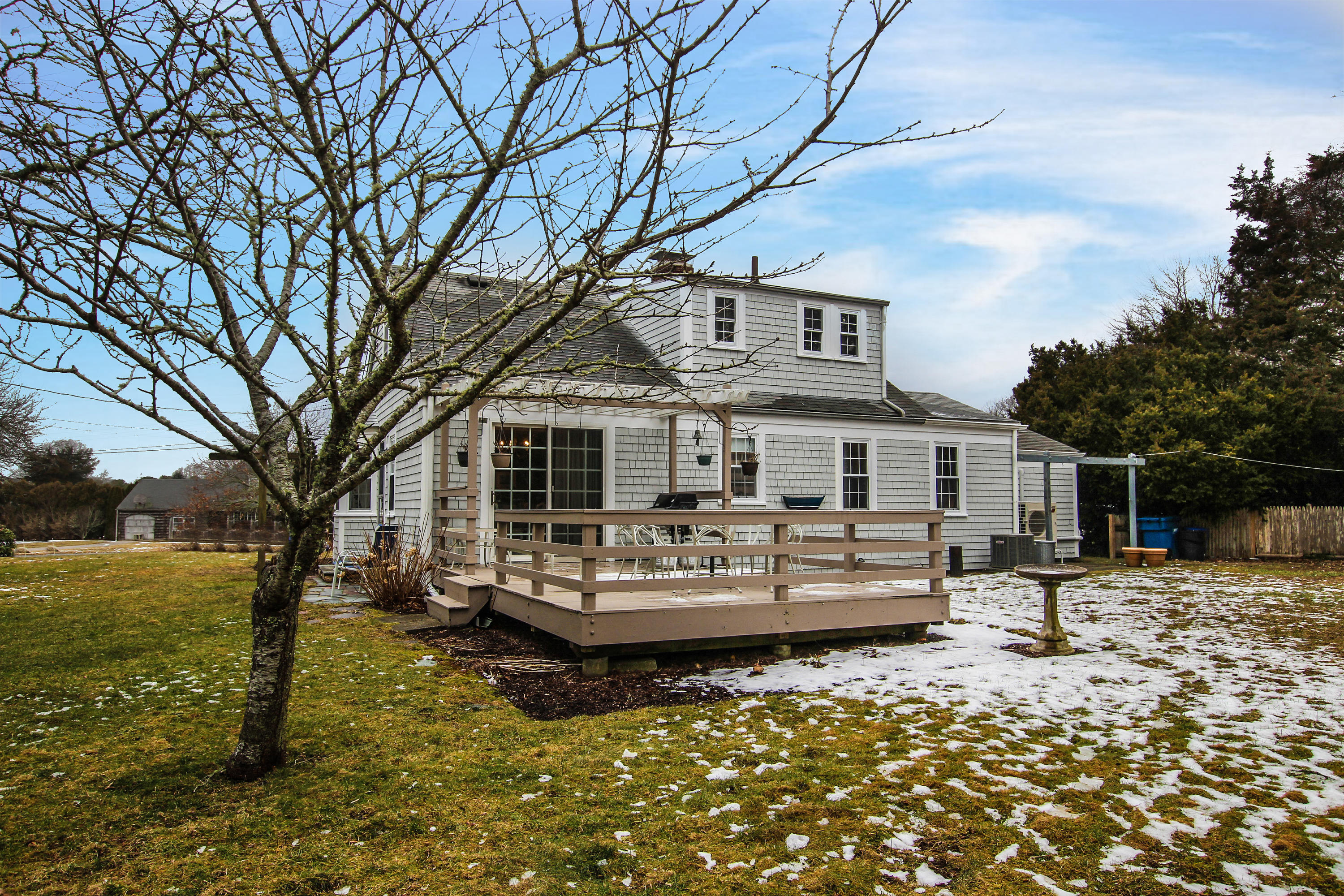 42 Circle Drive Hyannis, MA 02601 - Photo 1 of 25 a front view of a house with a yard