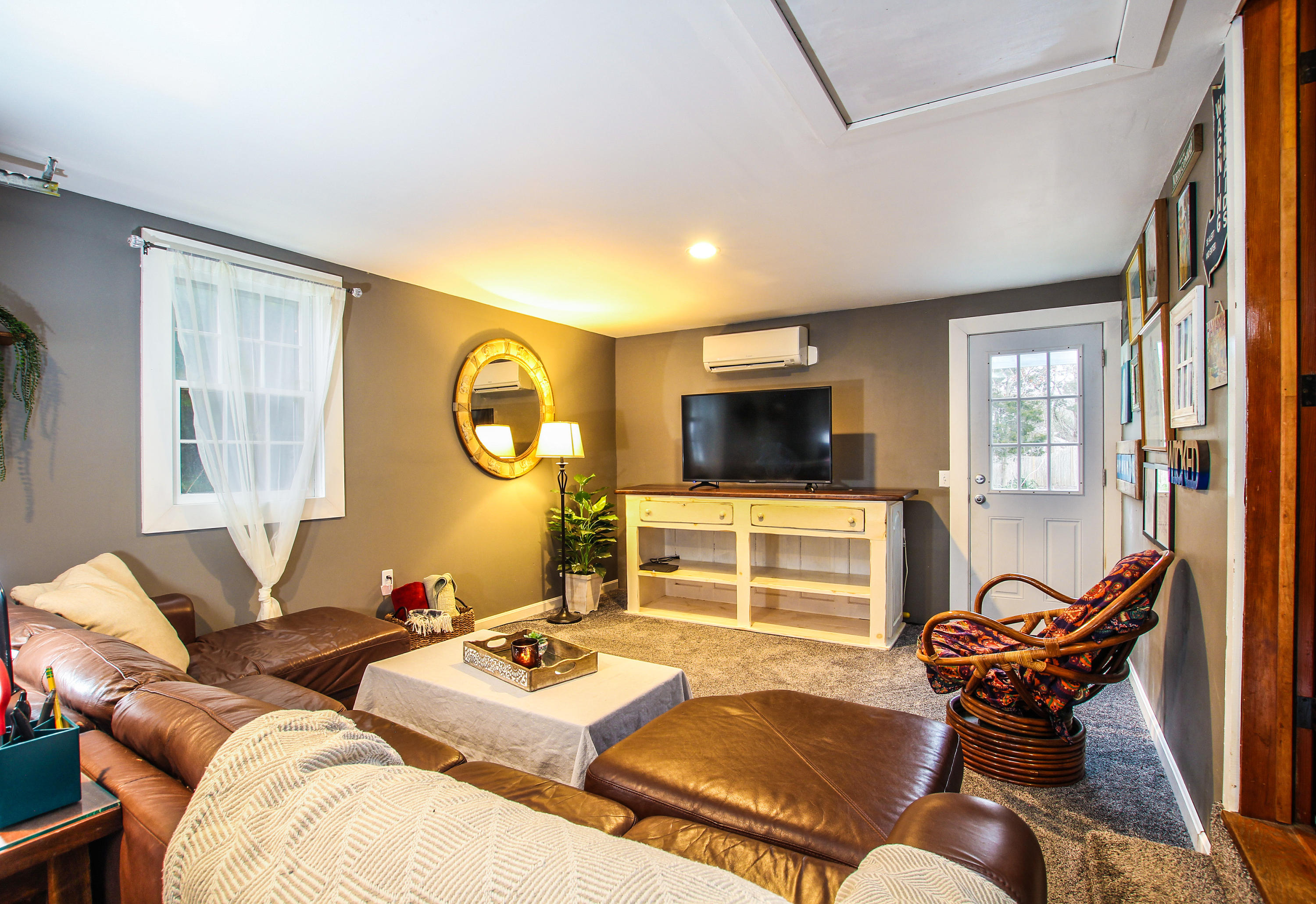 42 Circle Drive Hyannis, MA 02601 - Photo 15 of 25 a living room with furniture and a flat screen tv