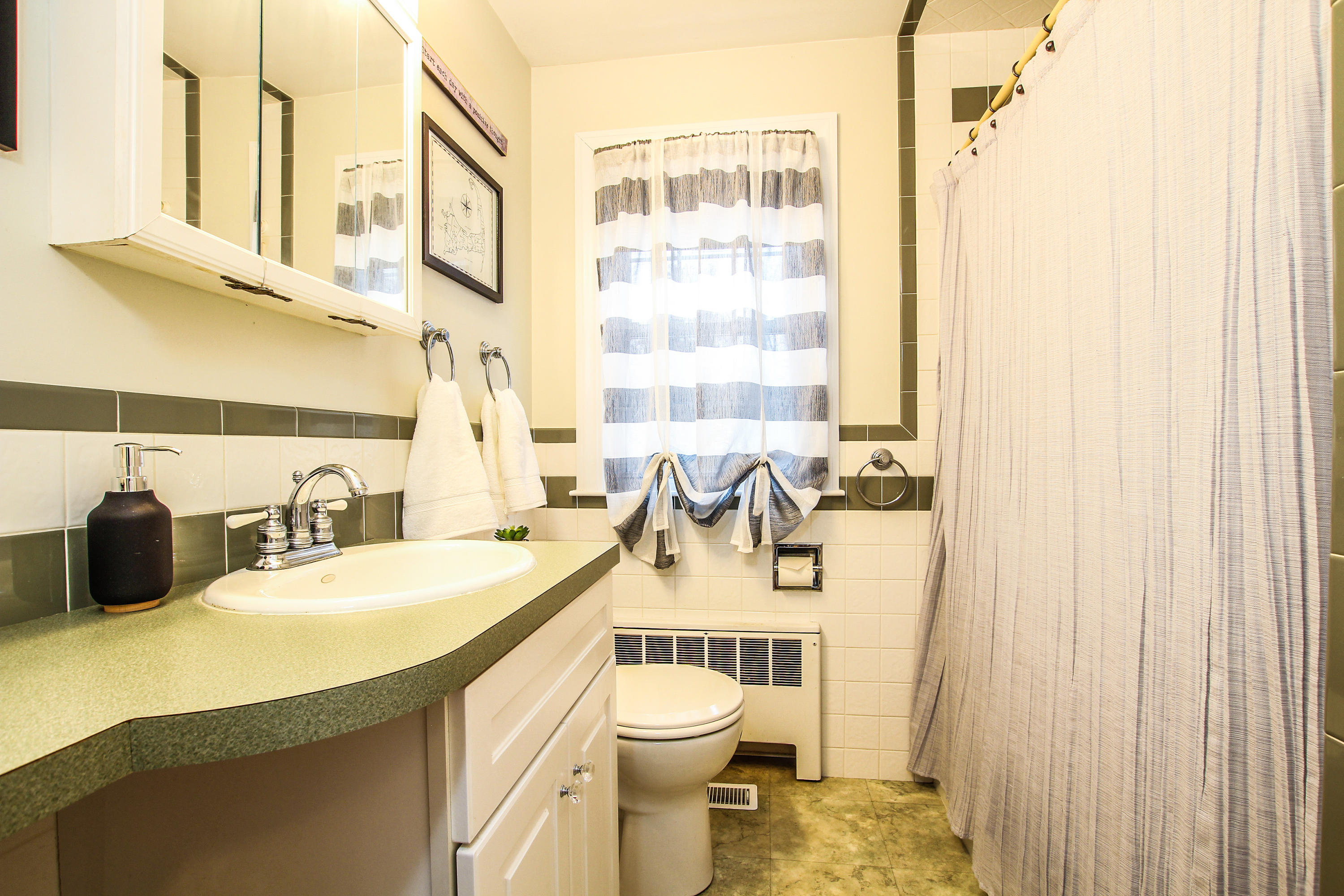 42 Circle Drive Hyannis, MA 02601 - Photo 19 of 25 a bathroom with a sink and a toilet