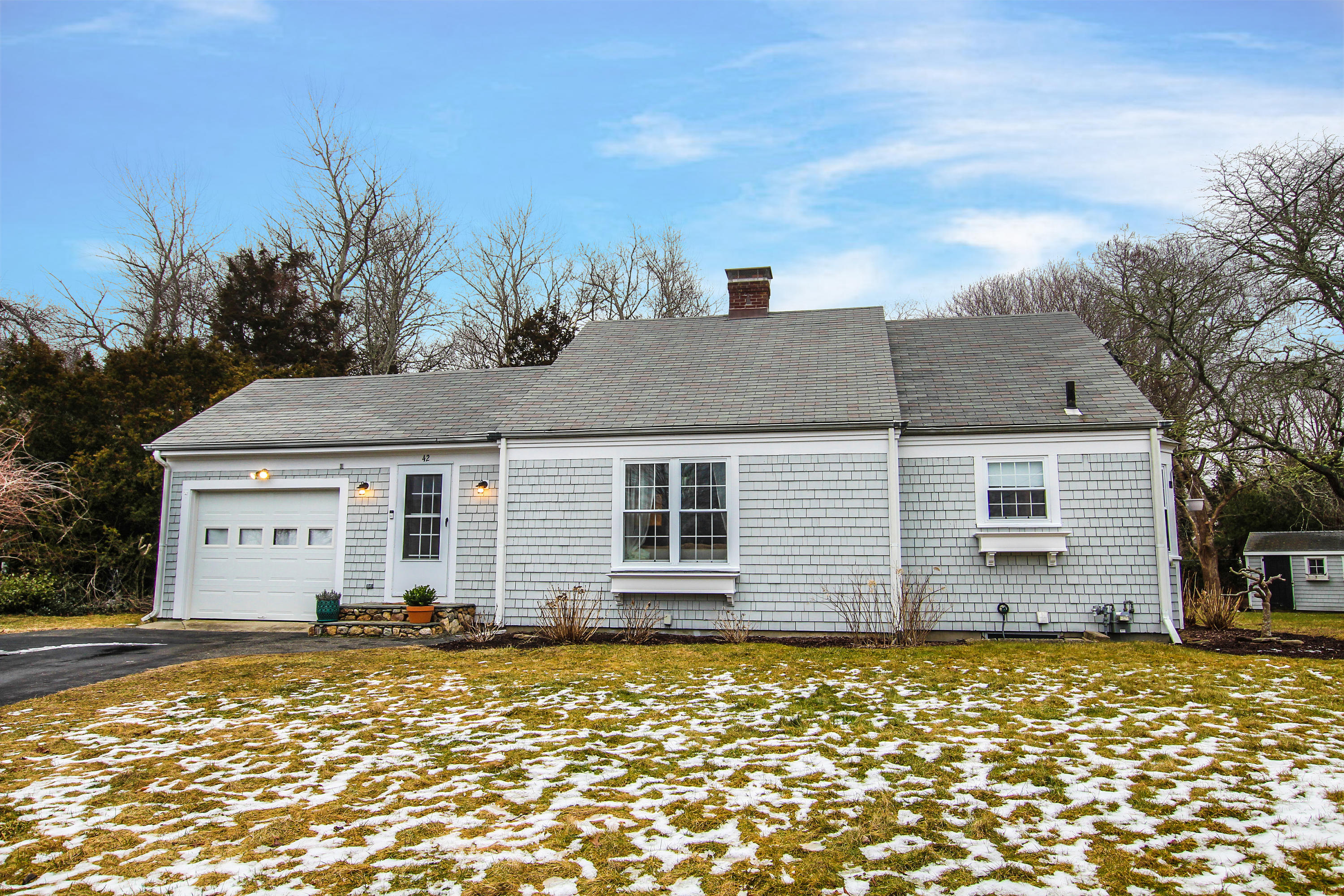 42 Circle Drive Hyannis, MA 02601 - Photo 2 of 25 a front view of a house with a yard