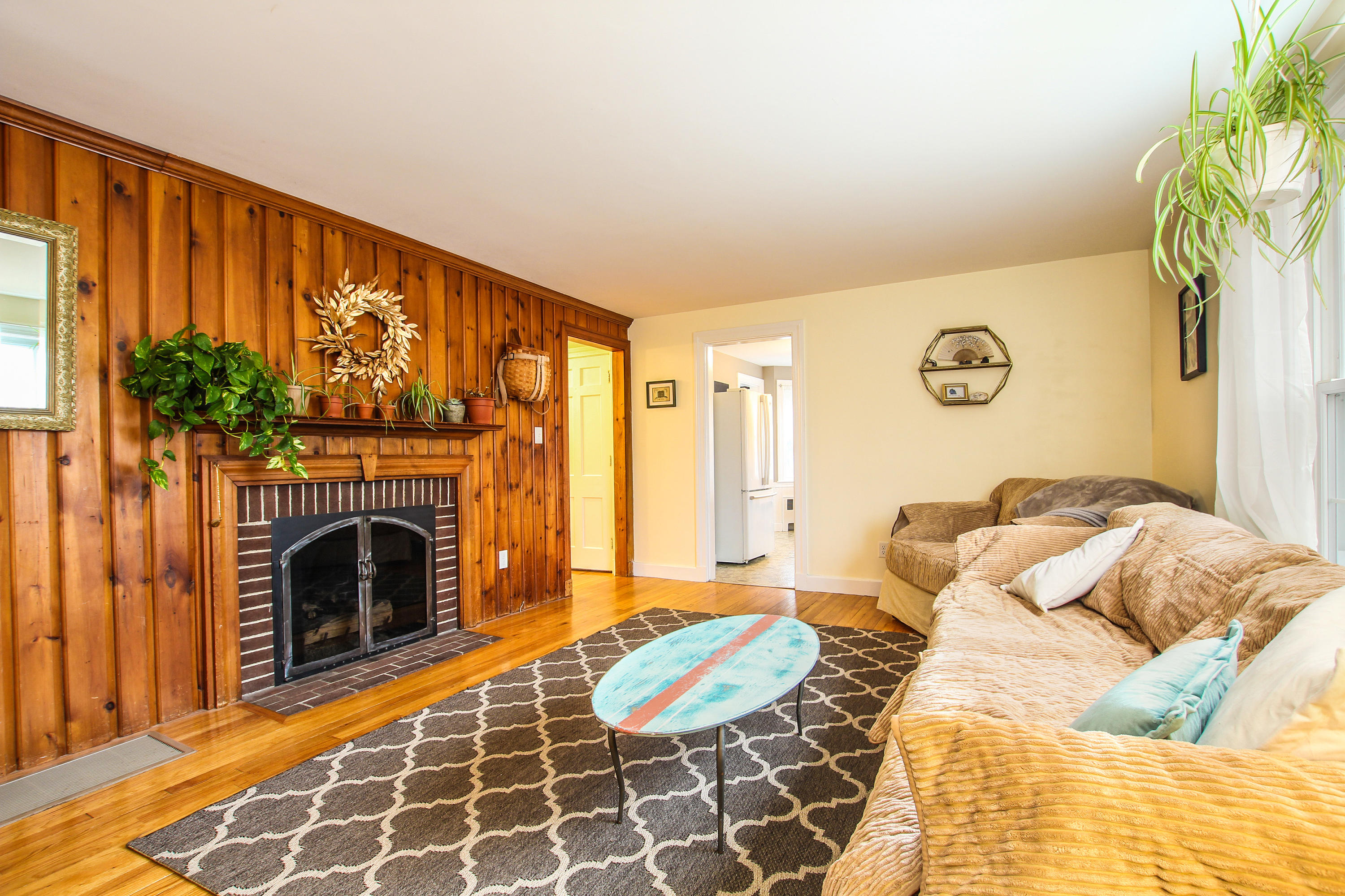 42 Circle Drive Hyannis, MA 02601 - Photo 5 of 25 a bedroom with a bed and a fireplace