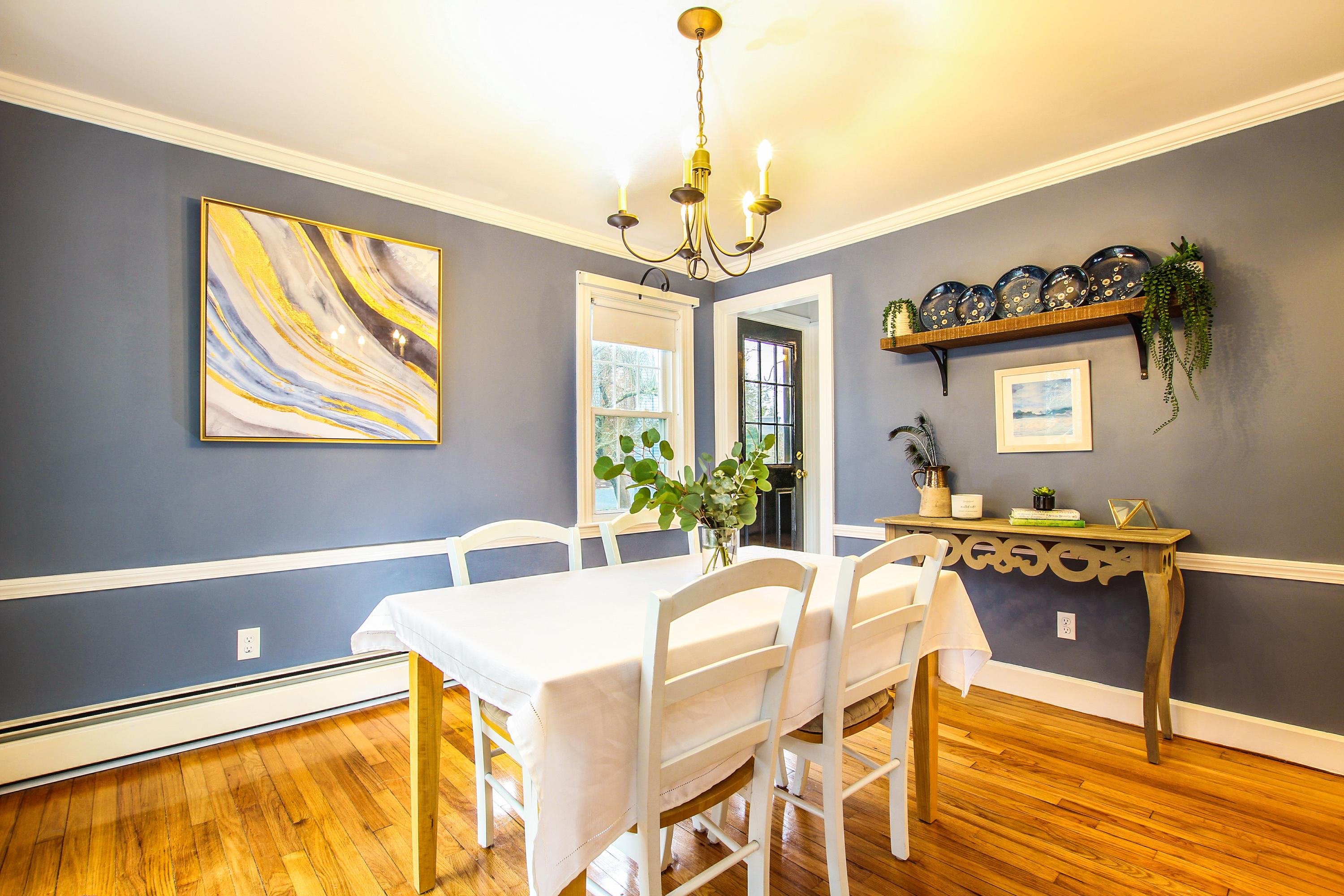 42 Circle Drive Hyannis, MA 02601 - Photo 8 of 25 a view of a dining room with furniture window and wooden floor