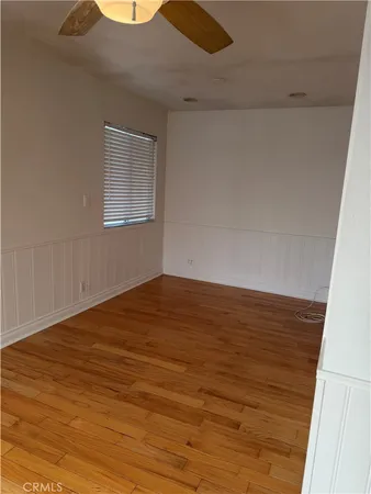 a bathroom with a granite countertop sink and a bathtub