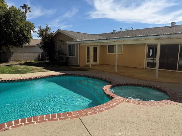 a view of balcony with wooden floor