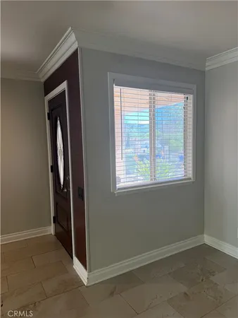 a view of a window with wooden floor