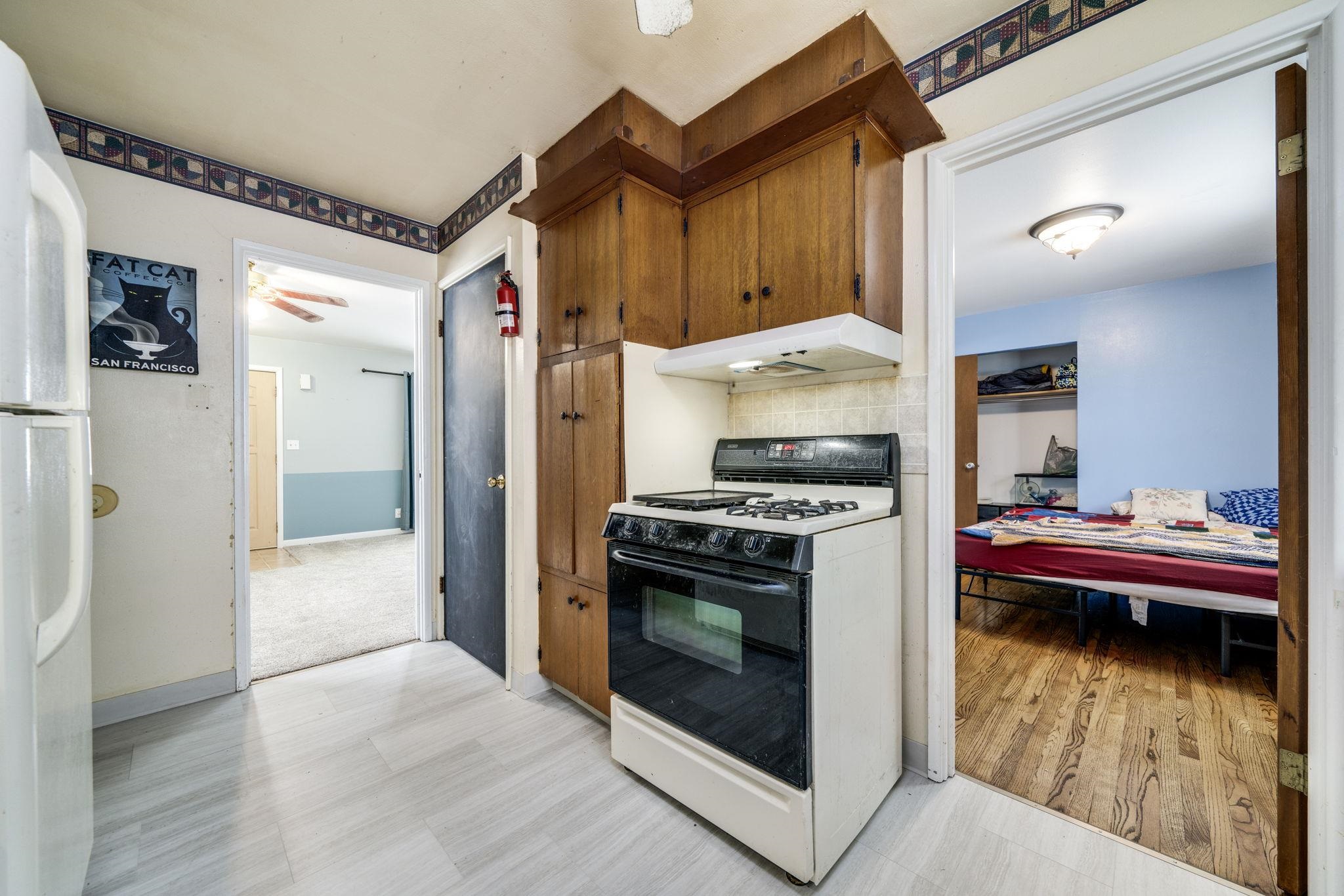 301 Barbara Street Mount Morris, IL 61054 - Photo 18 of 36 a kitchen that has a stove and a refrigerator