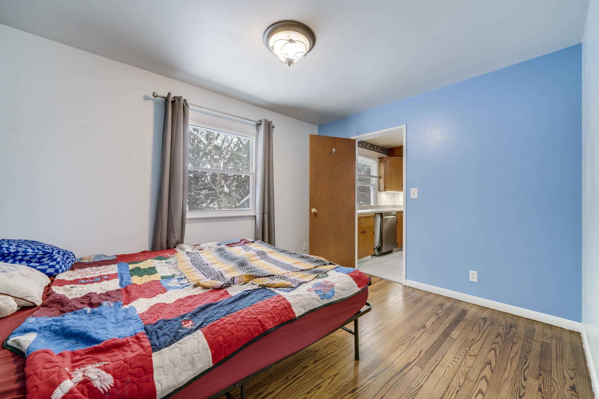 301 Barbara Street Mount Morris, IL 61054 - Photo 9 of 36 a bedroom with a bed and a window