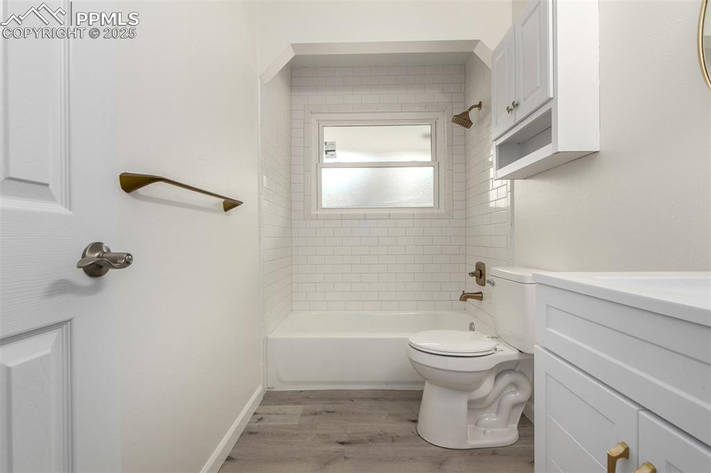 1216 Osgood Road Colorado Springs, CO 80915 - Photo 19 of 36 a bathroom with a toilet and a shower