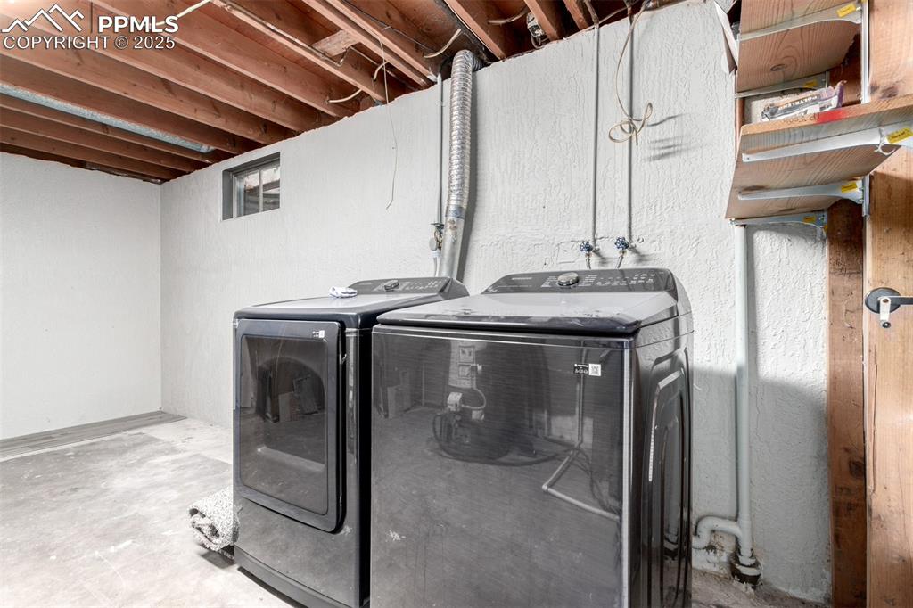 1216 Osgood Road Colorado Springs, CO 80915 - Photo 28 of 36 a utility room with dryer and washer