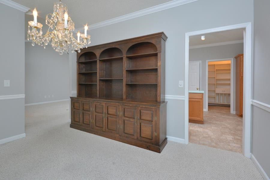 710 Latta Circle Durham, NC 27712 - Photo 23 of 42 wooden floor in an empty room with a window