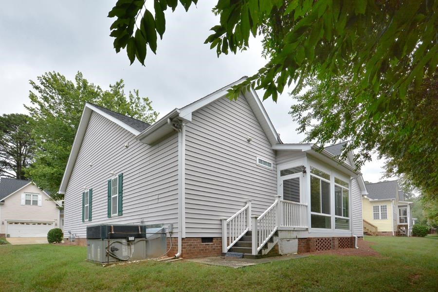 710 Latta Circle Durham, NC 27712 - Photo 42 of 42 a backyard of a house with table and chairs