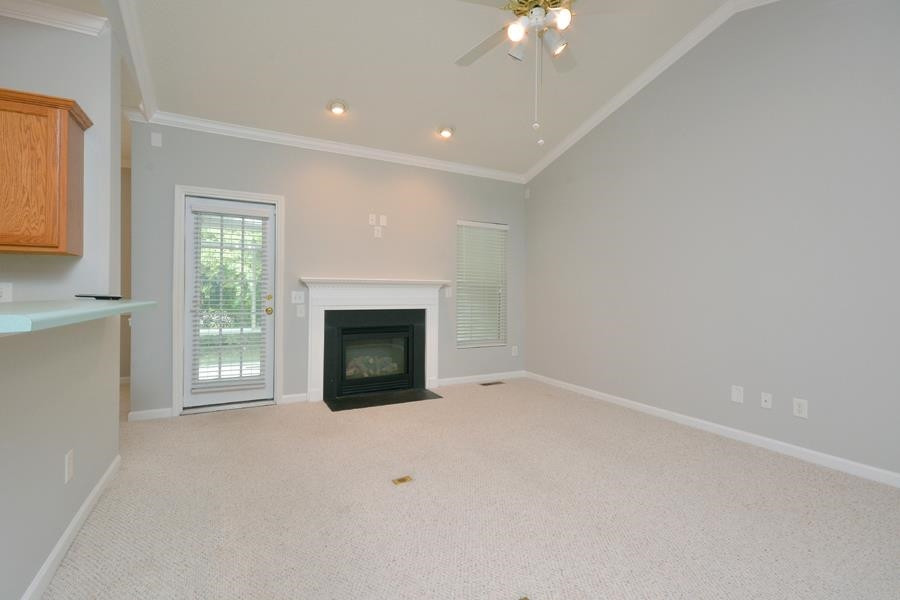 710 Latta Circle Durham, NC 27712 - Photo 5 of 42 a view of empty room with a fireplace