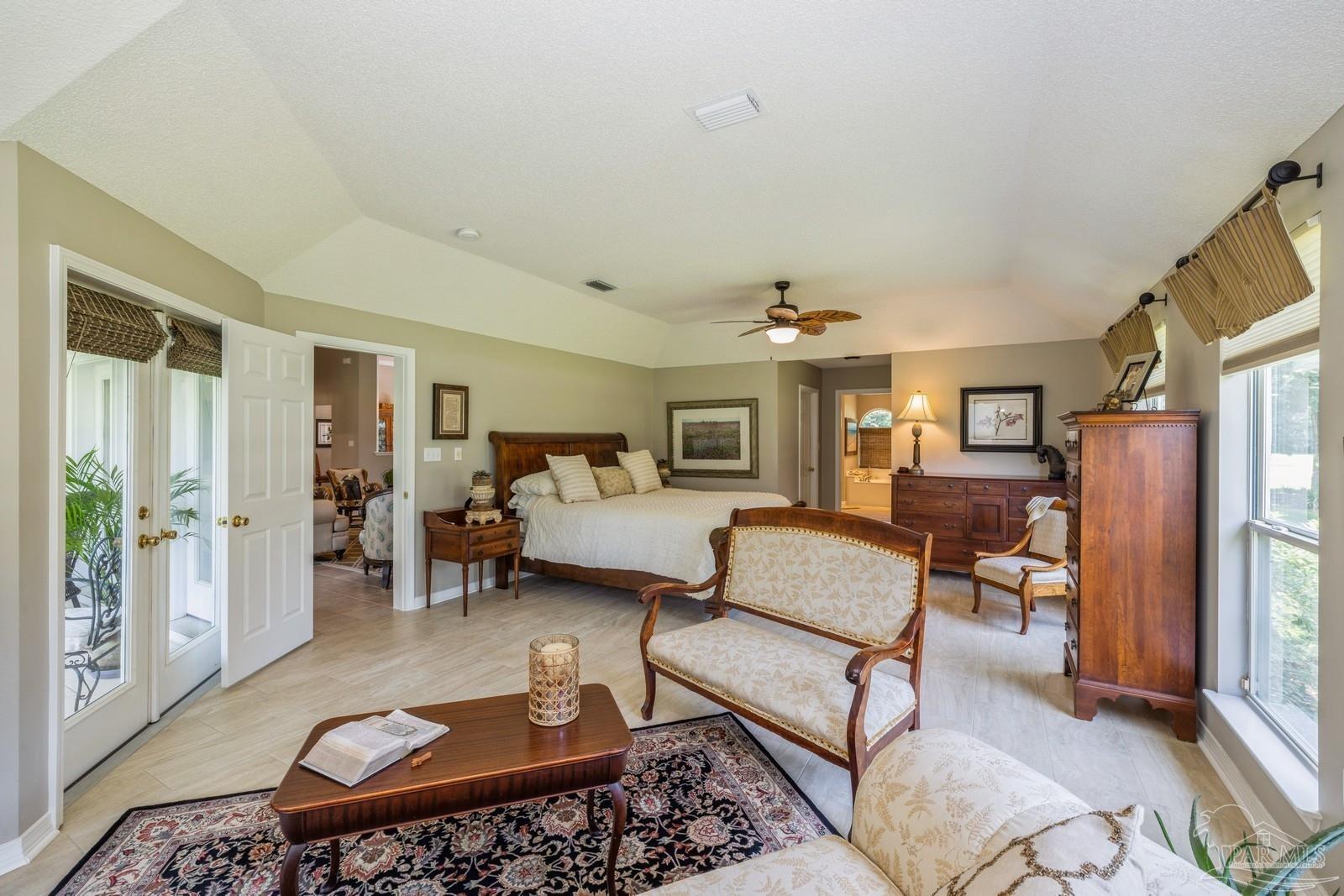 2808 P.G.A Boulevard Navarre, FL 32566 - Photo 23 of 54 a living room with furniture rug and a window
