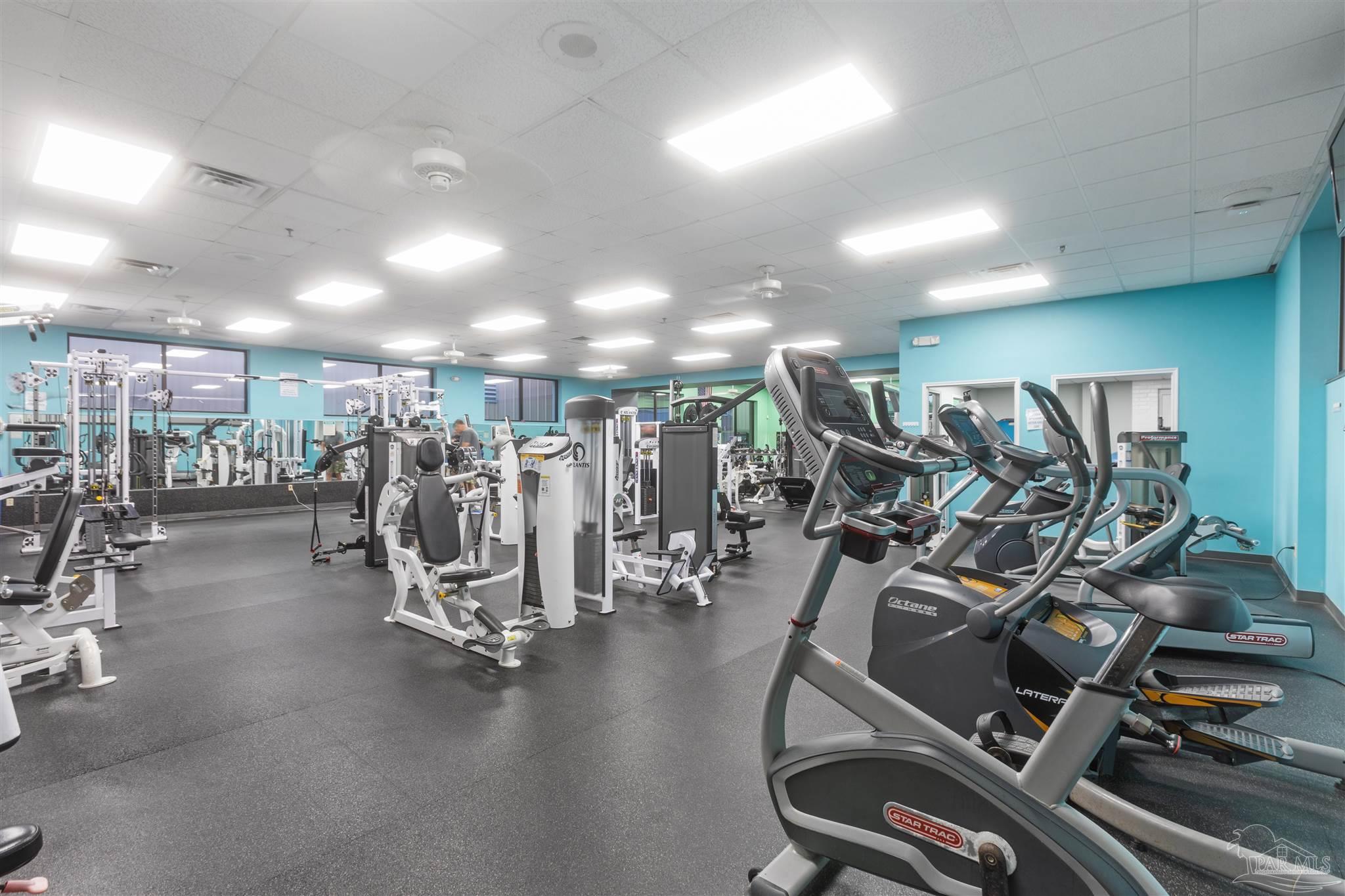 2808 P.G.A Boulevard Navarre, FL 32566 - Photo 50 of 54 a view of a room with gym equipment