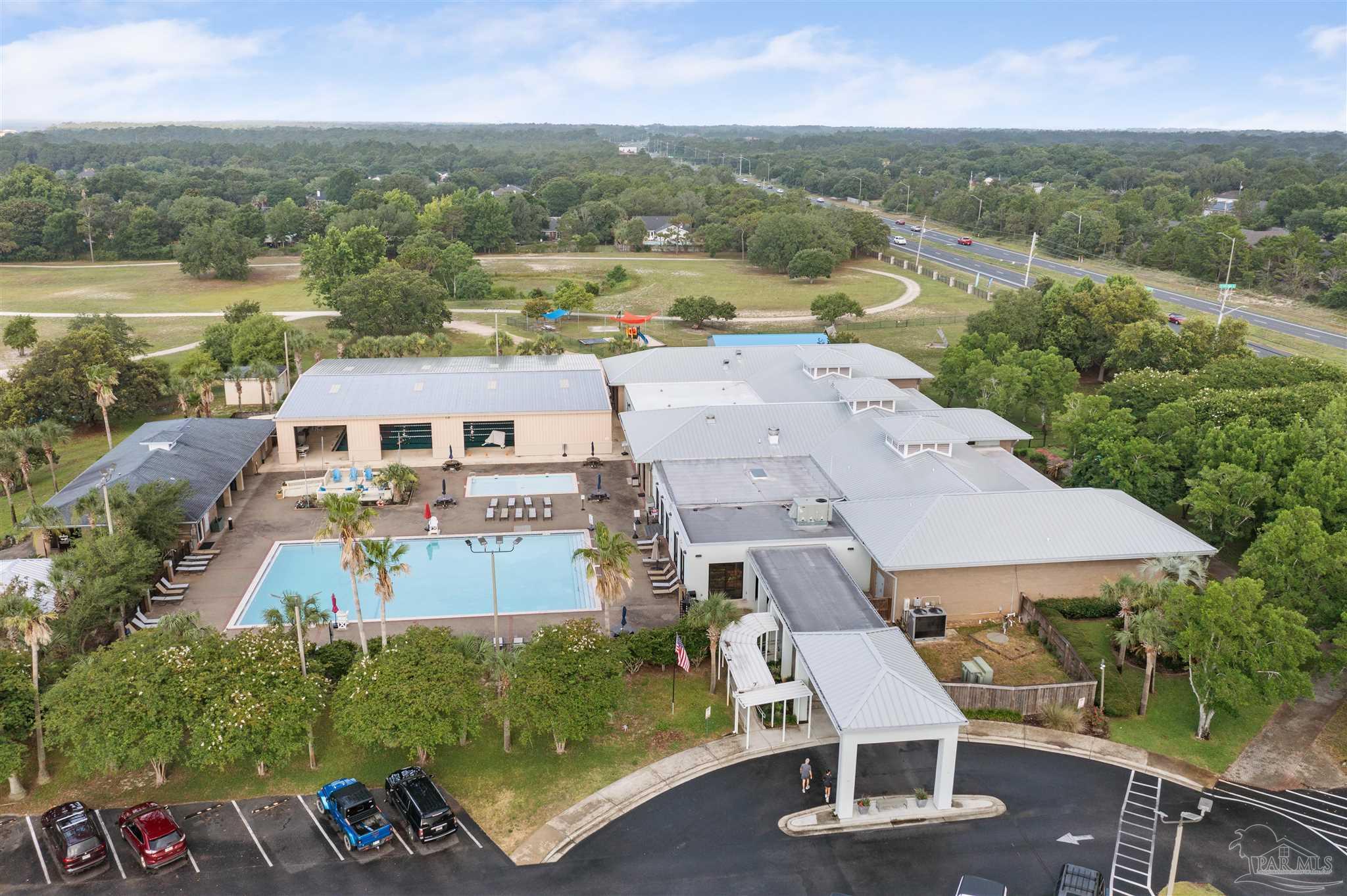 2808 P.G.A Boulevard Navarre, FL 32566 - Photo 52 of 54 an aerial view of residential houses with outdoor space and river