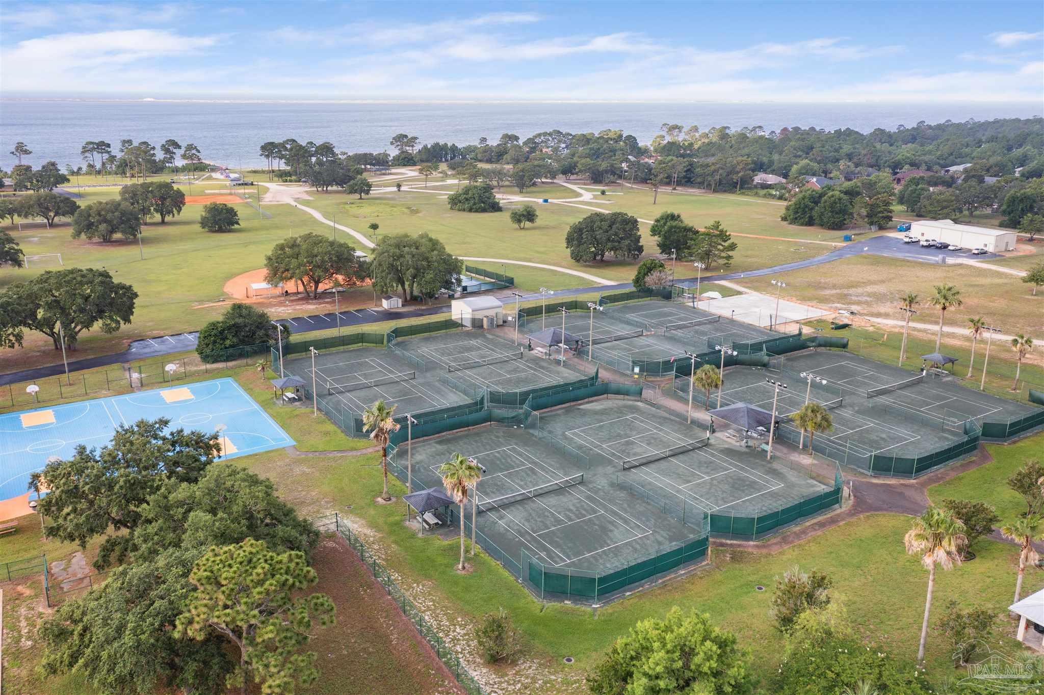 2808 P.G.A Boulevard Navarre, FL 32566 - Photo 53 of 54 an aerial view of residential houses with outdoor space