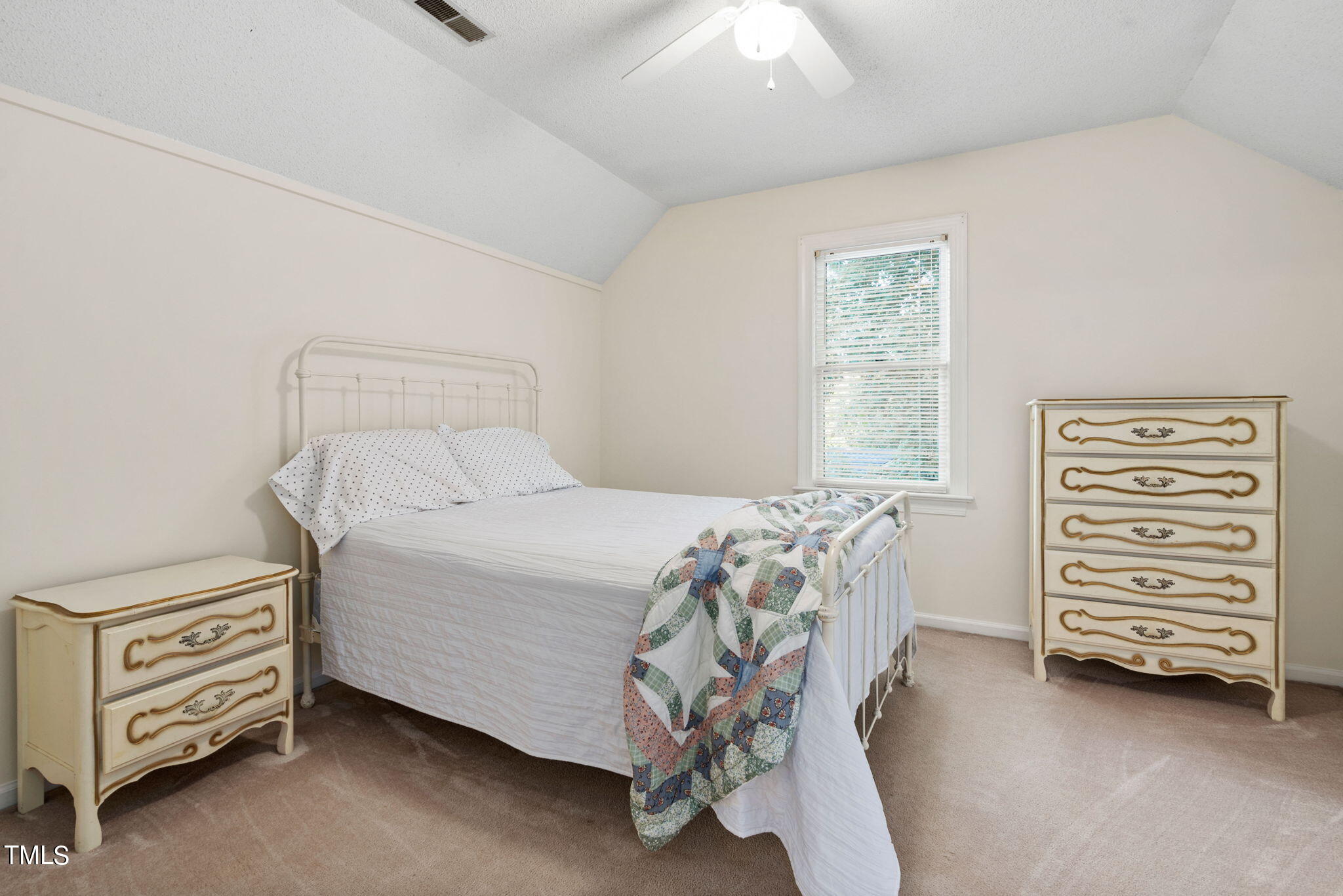 3205 Flintshire Road Raleigh, NC 27604 - Photo 20 of 31 a bedroom with a bed and a window