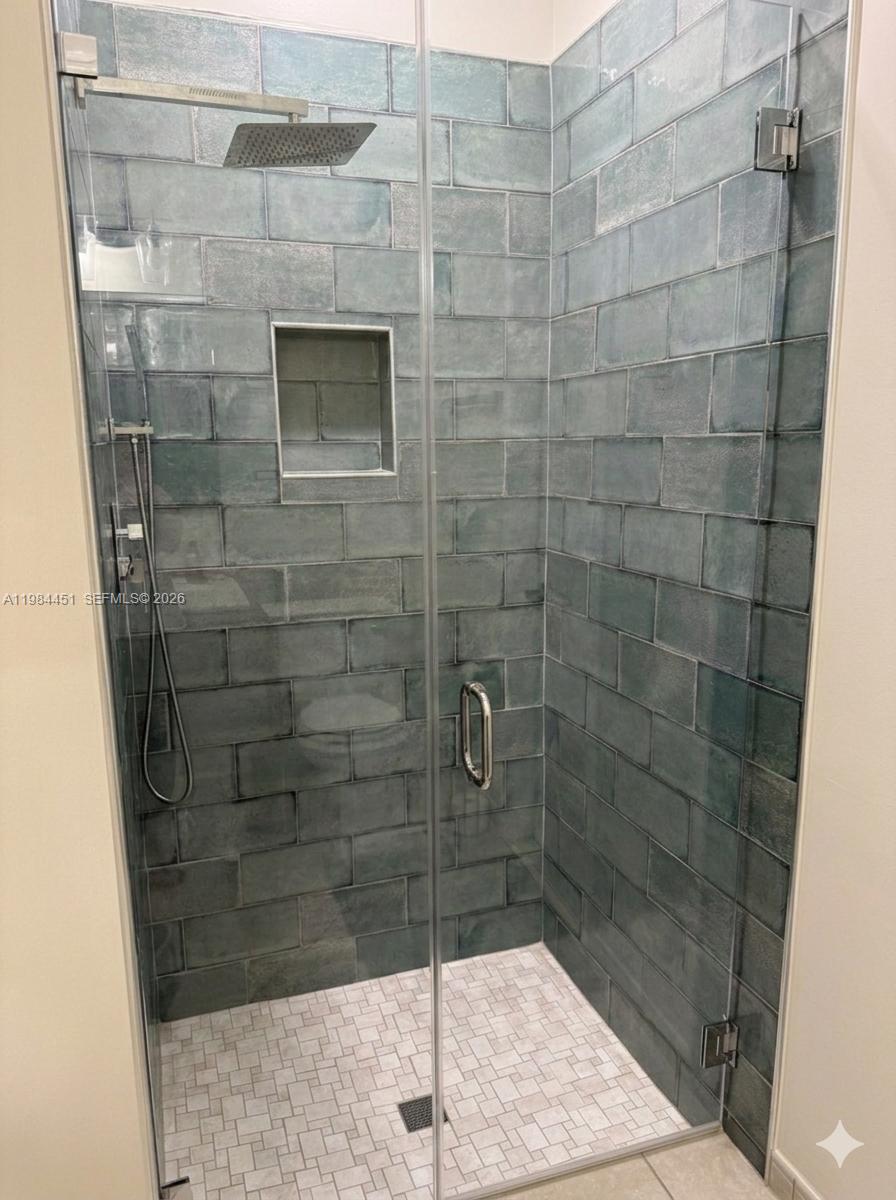 16364 Southwest 63rd Terrace Miami, FL 33193 - Photo 12 of 20 a bathroom with a shower