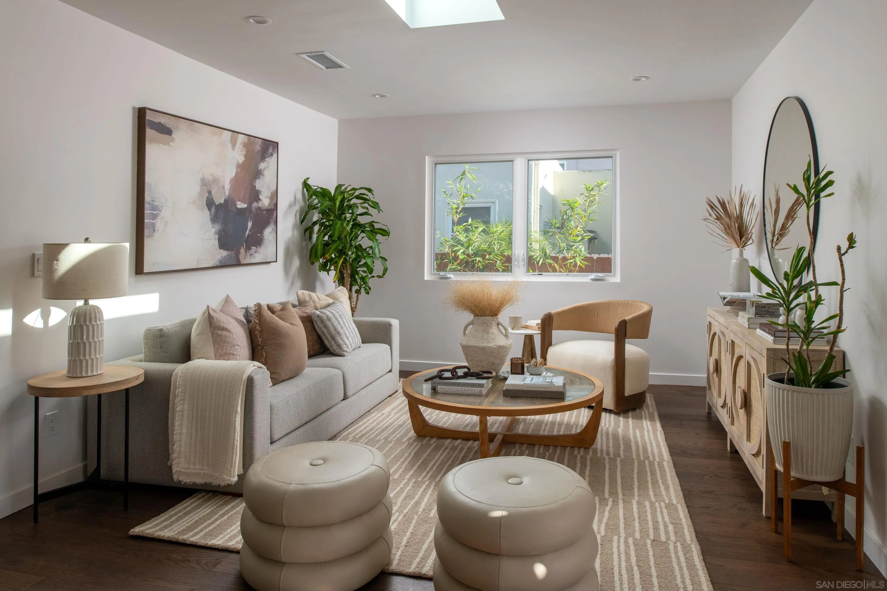 1025 Wilbur Avenue San Diego, CA 92109 - Photo 12 of 52 a living room with furniture a window and a potted plant