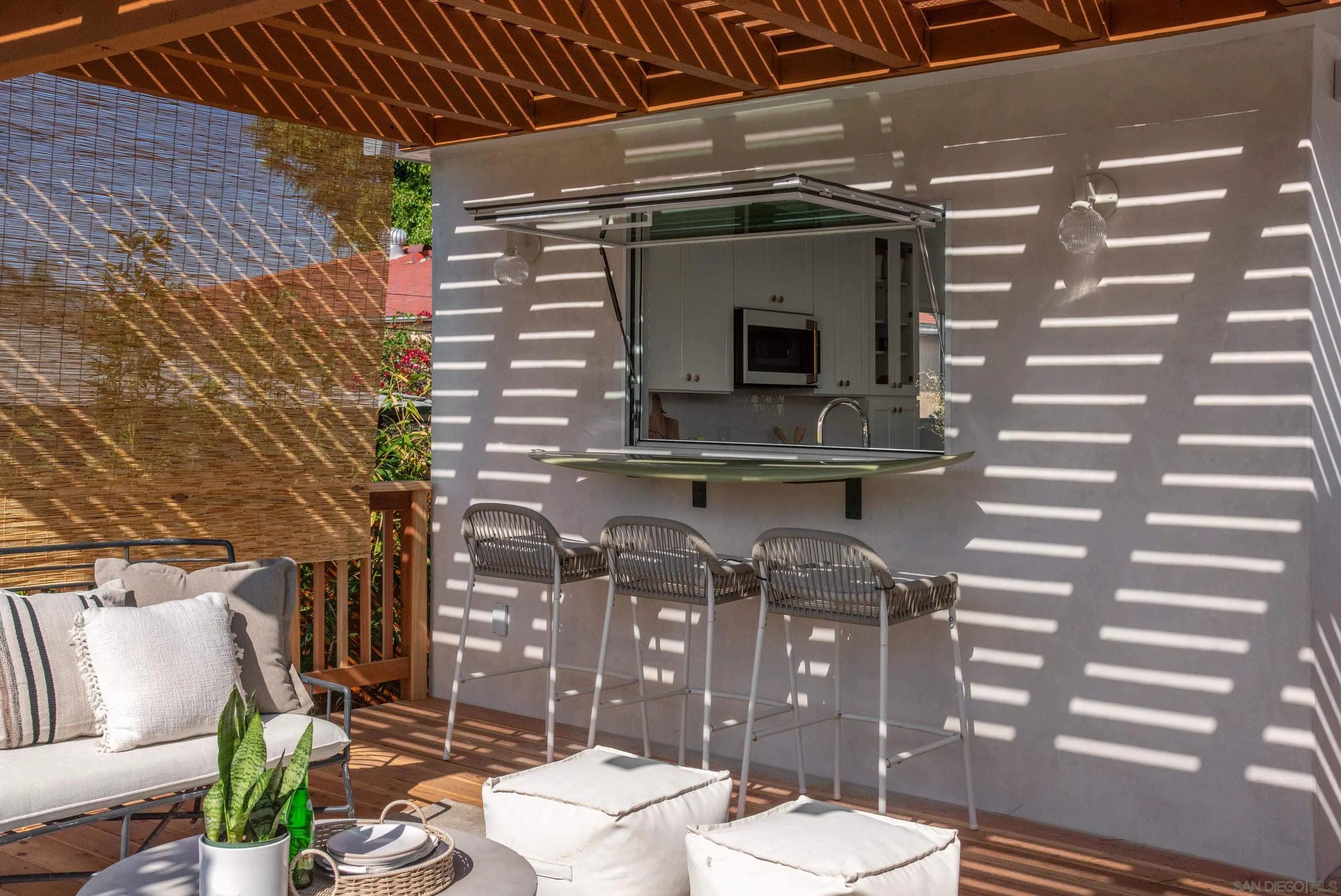 1025 Wilbur Avenue San Diego, CA 92109 - Photo 17 of 52 a view of a chairs and table in a patio