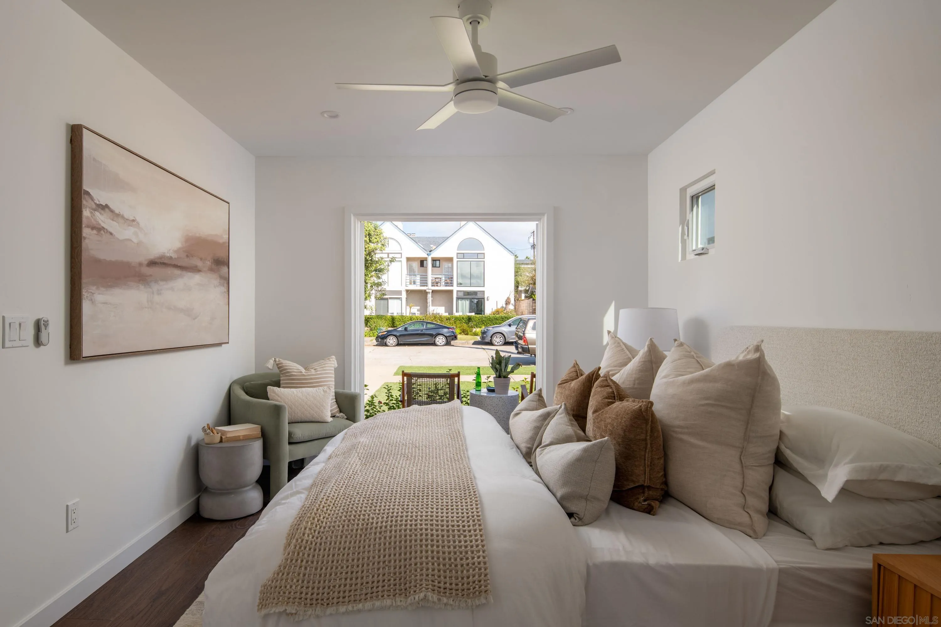 1025 Wilbur Avenue San Diego, CA 92109 - Photo 23 of 52 a living room with furniture and a large window