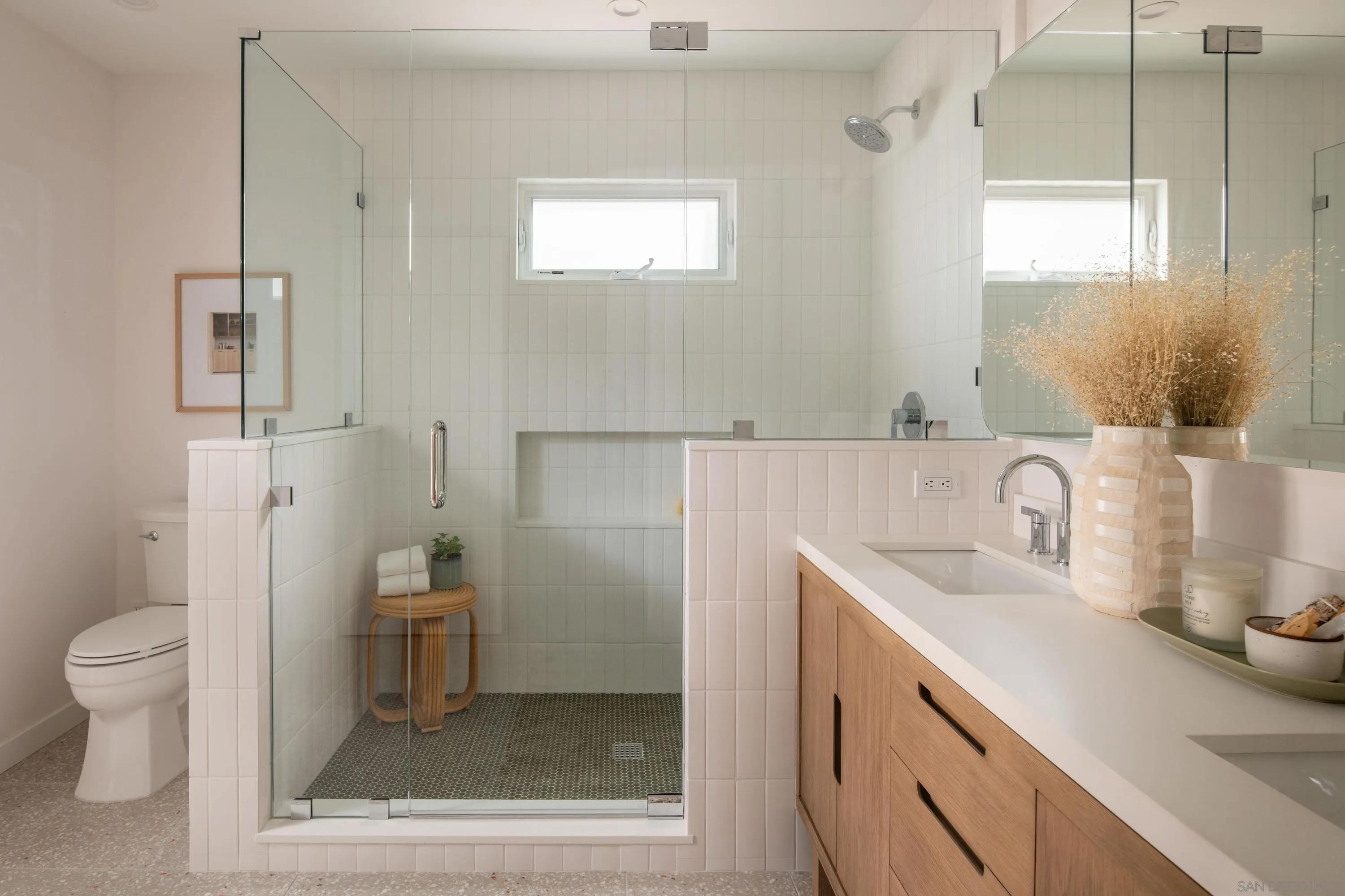 1025 Wilbur Avenue San Diego, CA 92109 - Photo 27 of 52 a bathroom with a sink toilet and shower