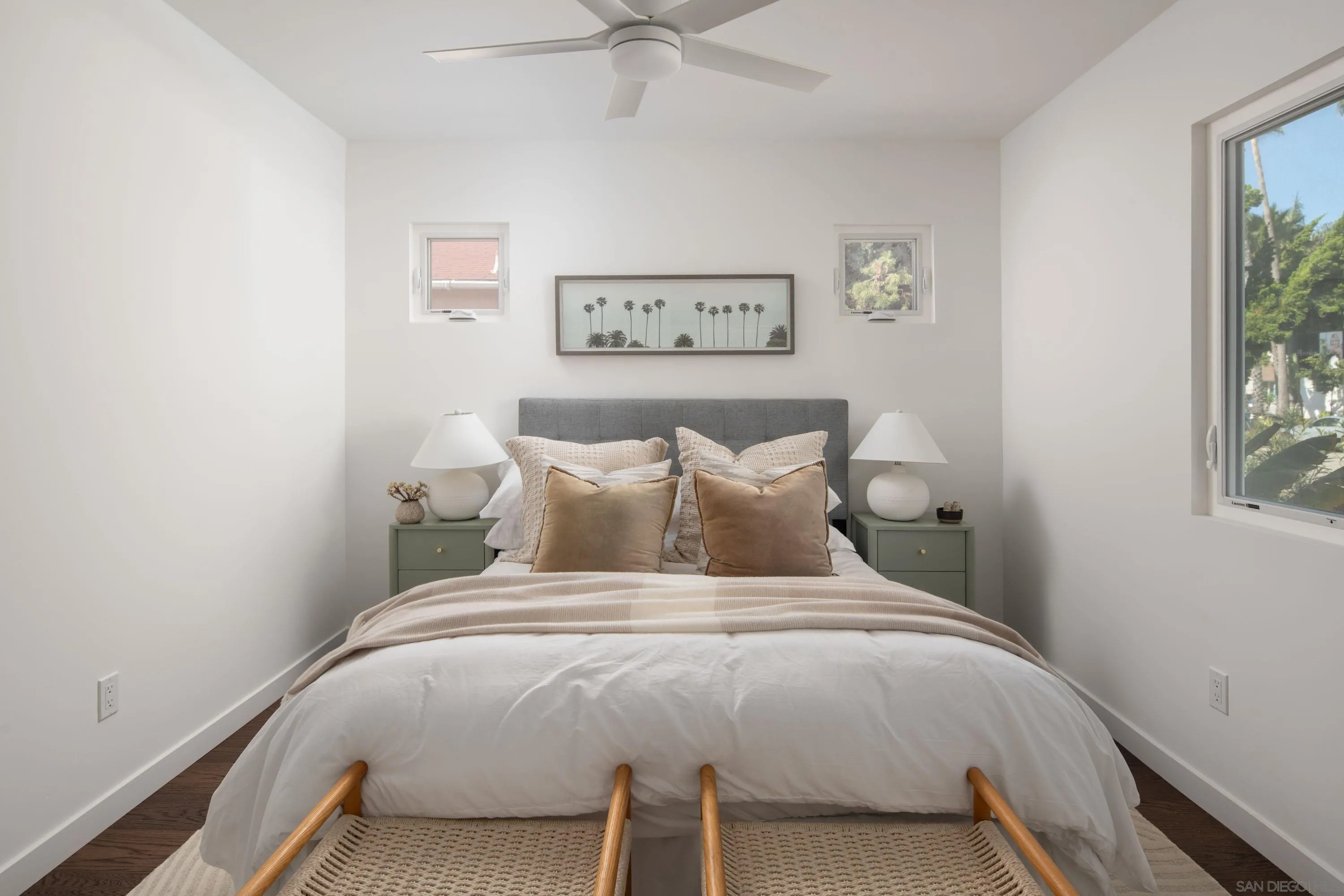 1025 Wilbur Avenue San Diego, CA 92109 - Photo 30 of 52 a large bed sitting in a bedroom next to a window