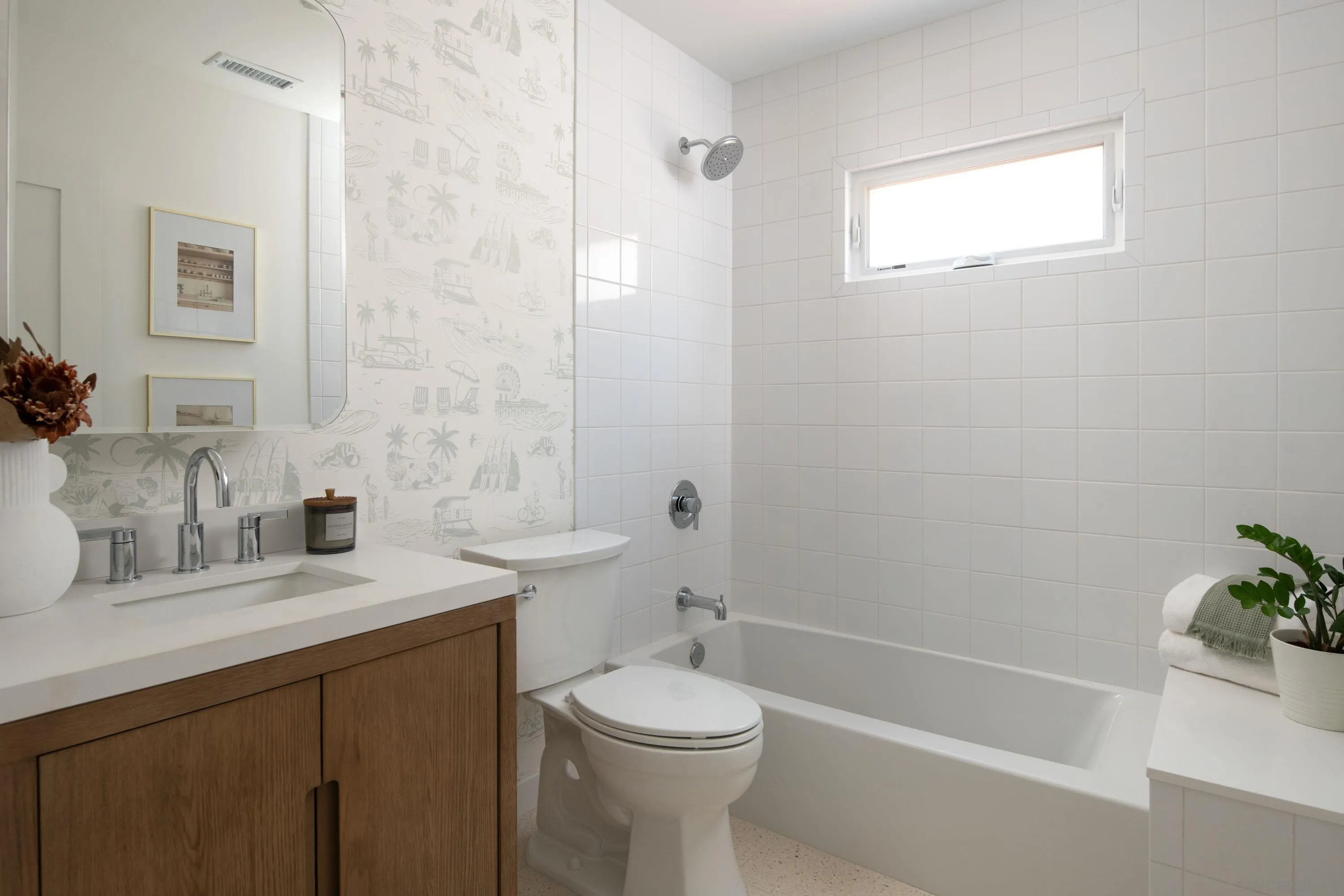 1025 Wilbur Avenue San Diego, CA 92109 - Photo 31 of 52 a bathroom with a sink a toilet and shower