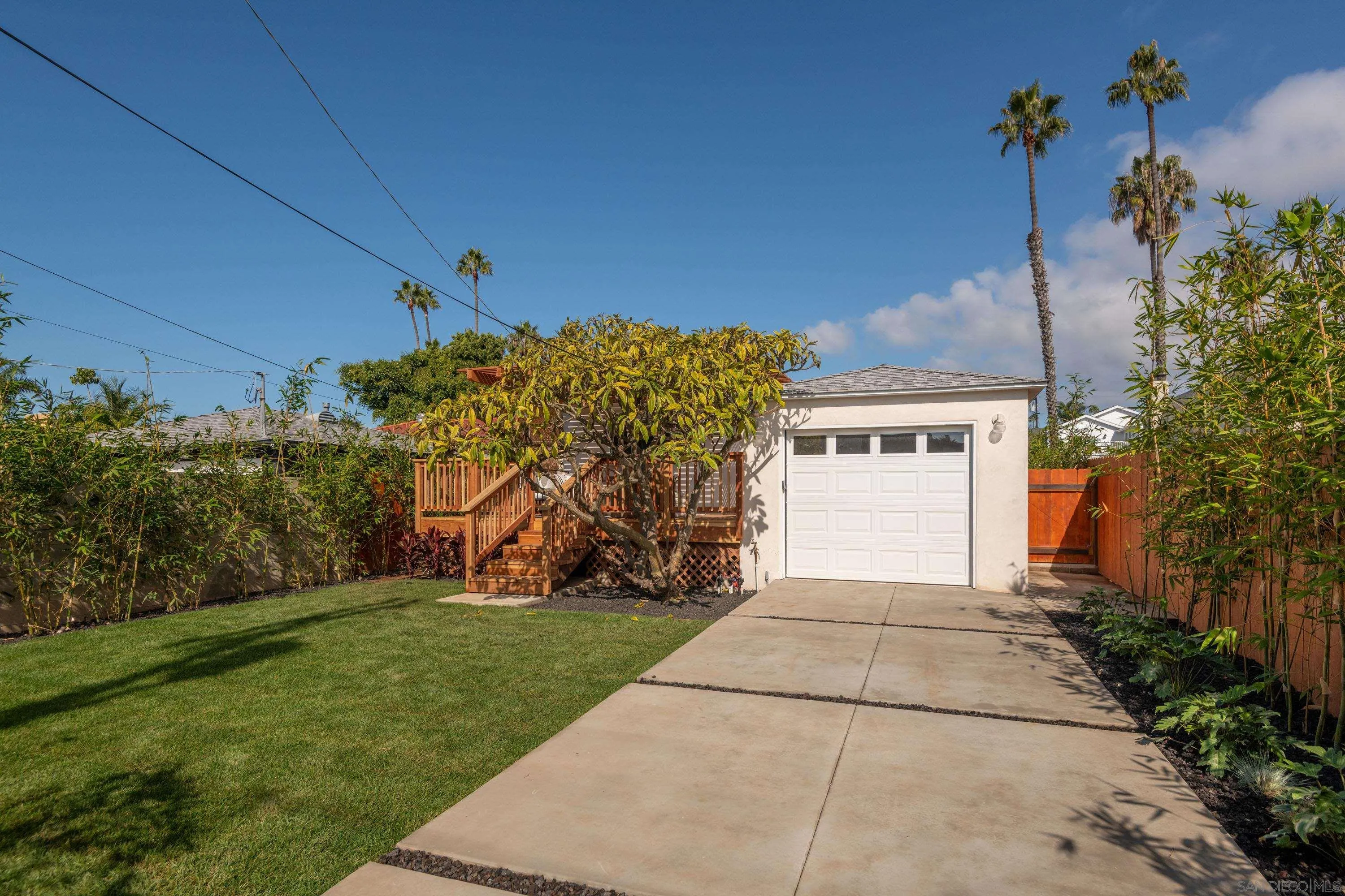 1025 Wilbur Avenue San Diego, CA 92109 - Photo 37 of 52 a view of a pathway with a house in the background