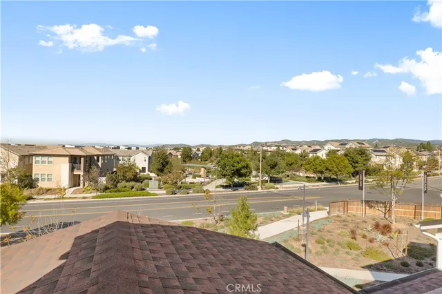 a view of a house with a street