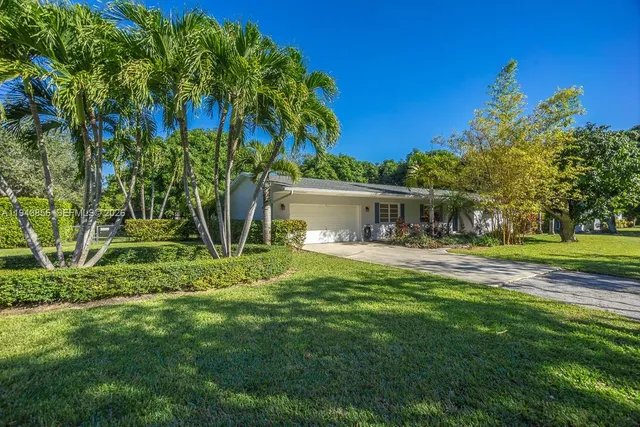 a house view with a garden space