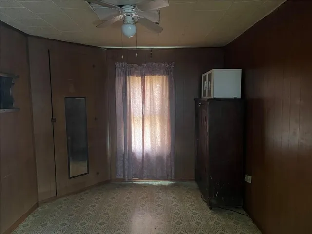 a view of a room with a bench