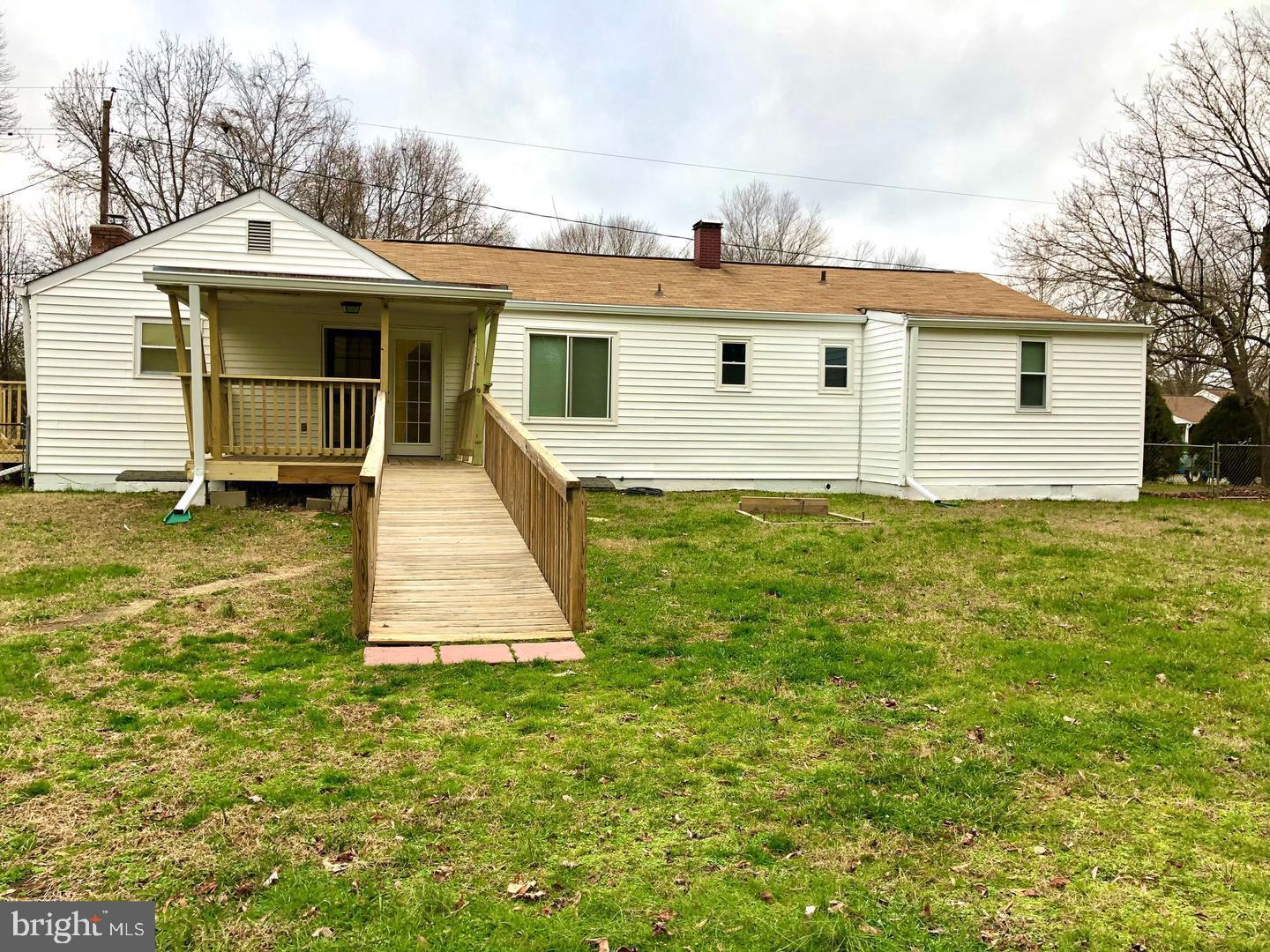 114 River Road Edgewater, MD 21037 - Photo 26 of 33 Back of home w/ ramp to rear