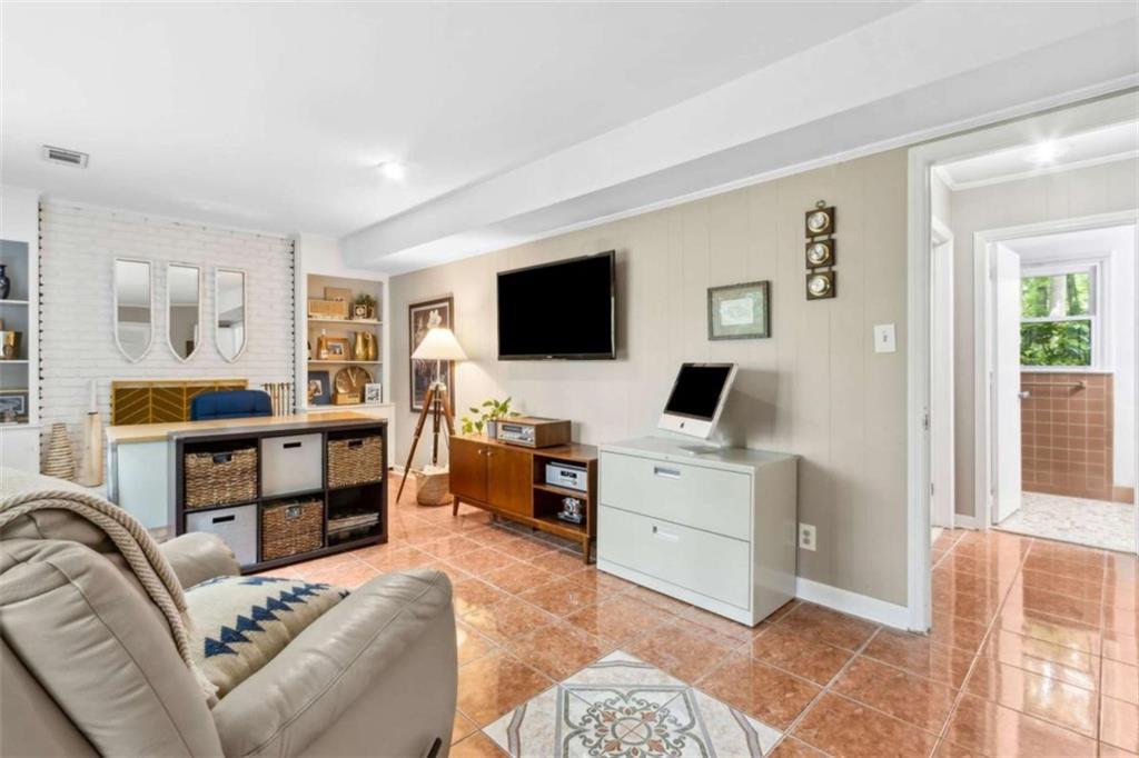 3362 Northbrook Drive Atlanta, GA 30340 - Photo 26 of 55 a living room with furniture and a flat screen tv