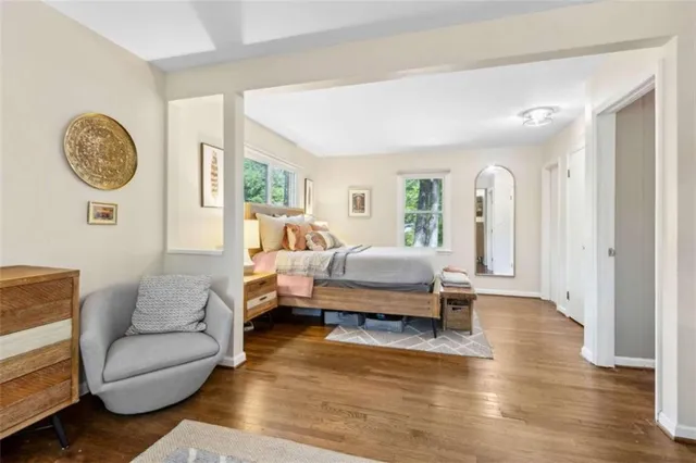 a bedroom with a bed and cabinets