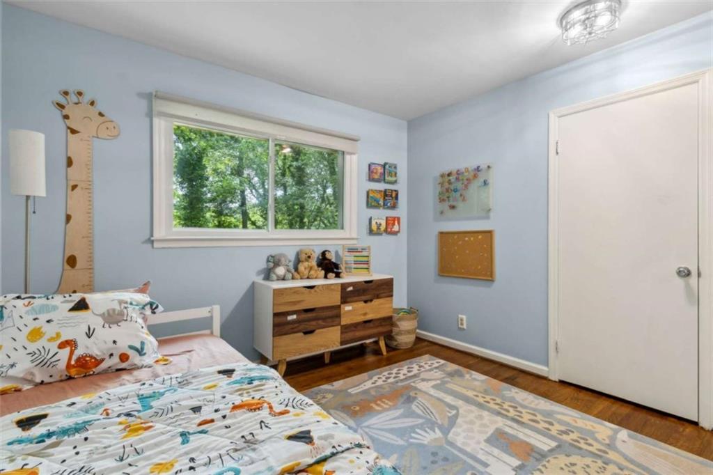 3362 Northbrook Drive Atlanta, GA 30340 - Photo 45 of 55 a bedroom with a bed and a window
