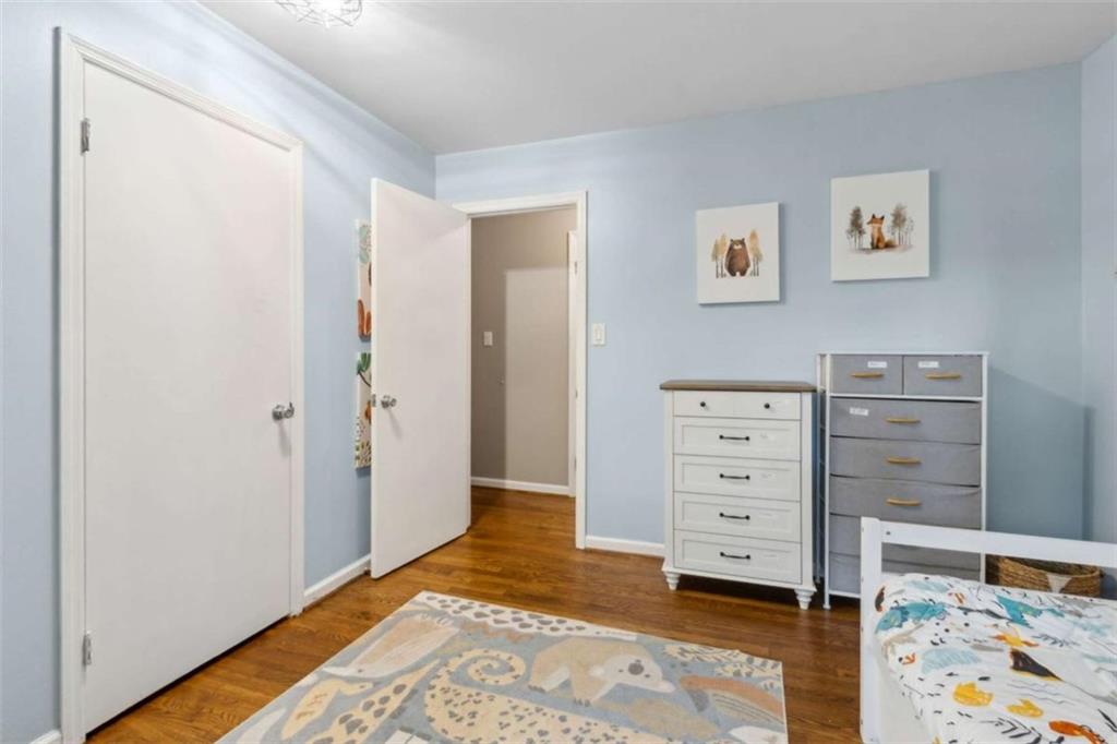 3362 Northbrook Drive Atlanta, GA 30340 - Photo 47 of 55 a view of a bedroom with baby bed and closet