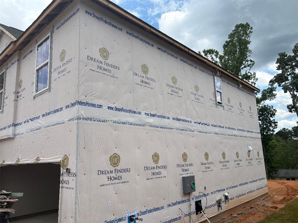 152 Cedar Shoals Easley, SC 29640 - Photo 2 of 15 This exterior view showcases the early stages of a residential structure, offering a glimpse into its construction.