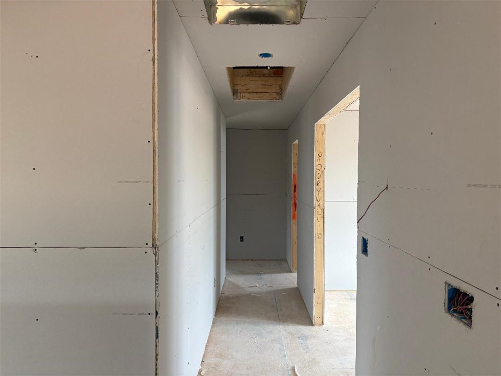 152 Cedar Shoals Easley, SC 29640 - Photo 7 of 15 This interior hallway offers a glimpse into a new construction project, showcasing a functional layout.