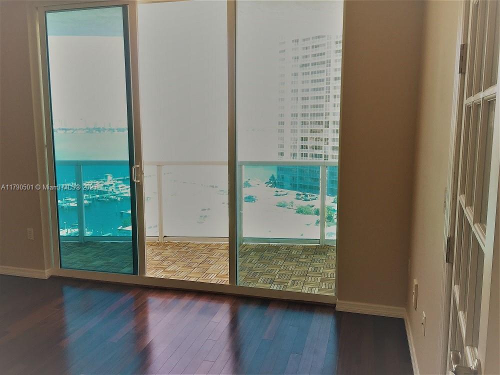 1881 79th Street Causeway, Unit 1106 North Bay Village, FL 33141 - Photo 14 of 20 a view of a glass door and window